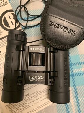 Binoculars, Bushnell. Clips onto a belt.